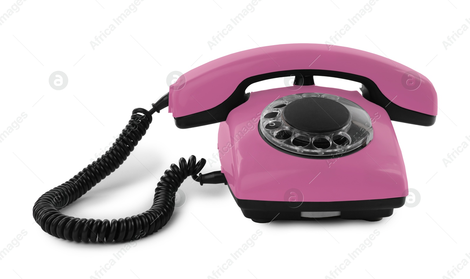 Image of Old pink telephone with rotary dial isolated on white