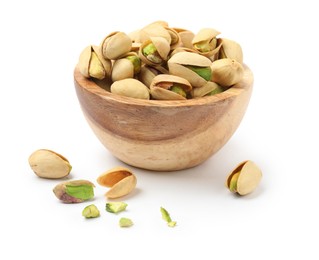 Tasty pistachio nuts in bowl isolated on white