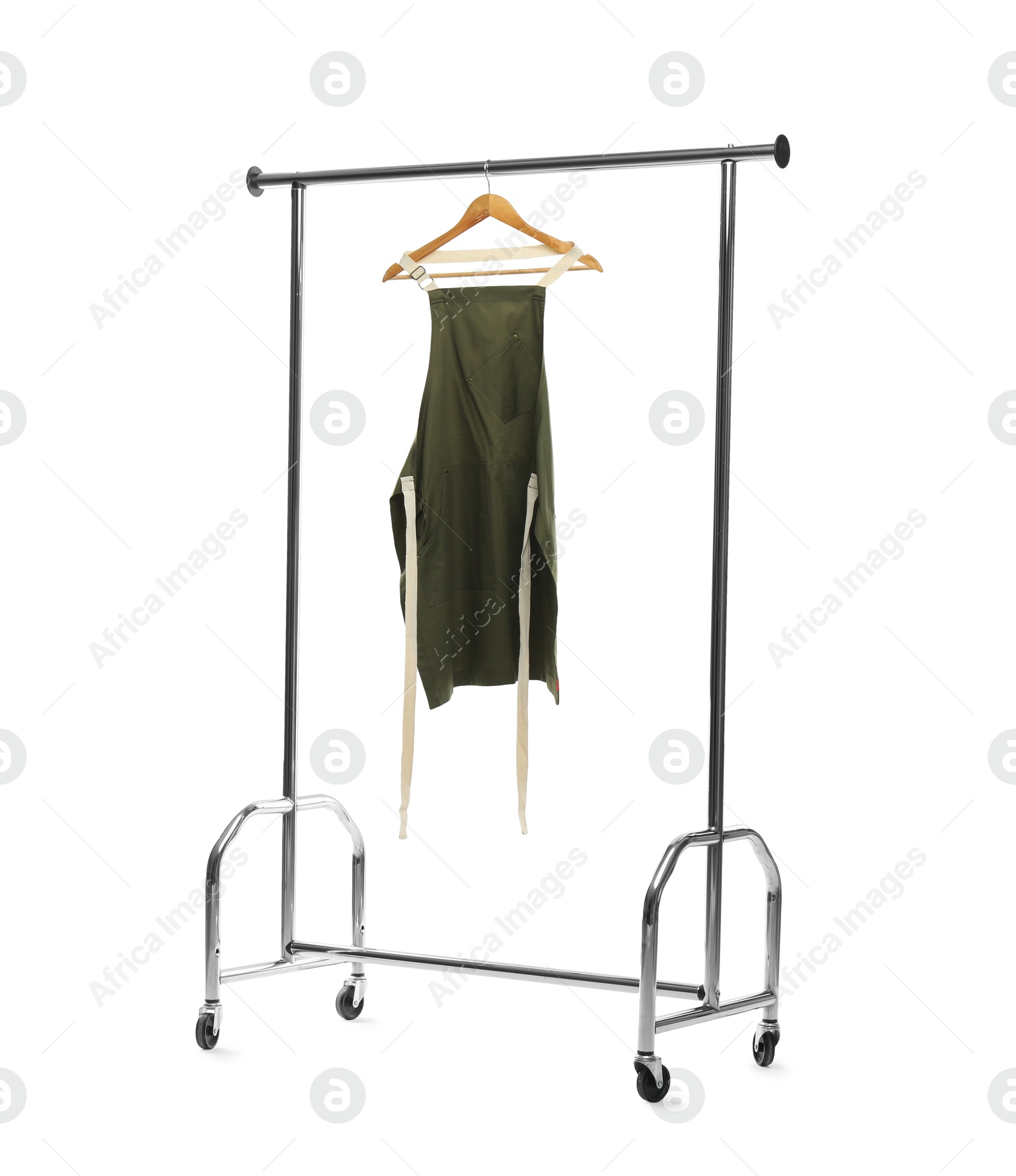 Photo of Chef's apron on clothing rack isolated on white