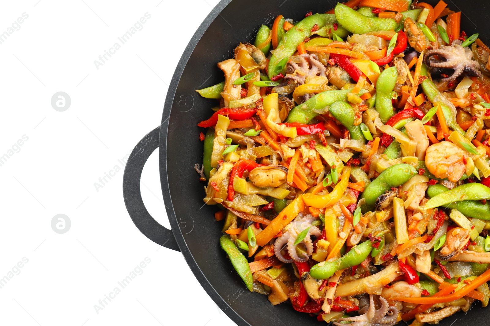 Photo of Stir-fry sea food in wok isolated on white, top view