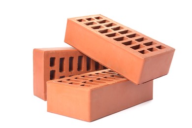 Red bricks isolated on white. Building material