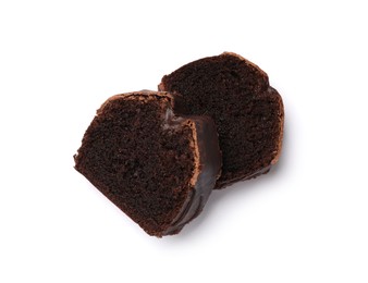 Photo of Slices of tasty chocolate sponge cake isolated on white, above view