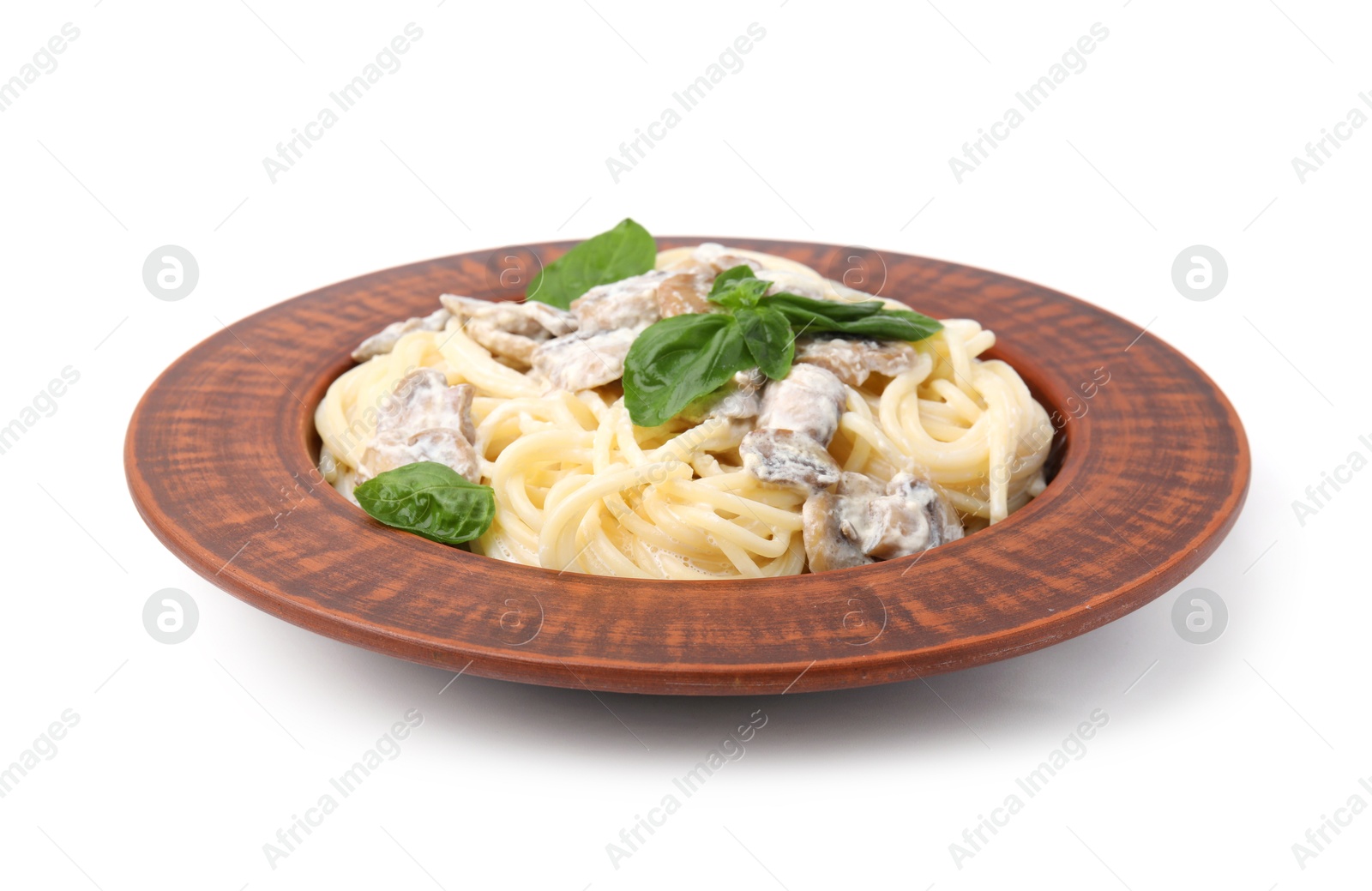 Photo of Delicious pasta with mushrooms and basil isolated on white