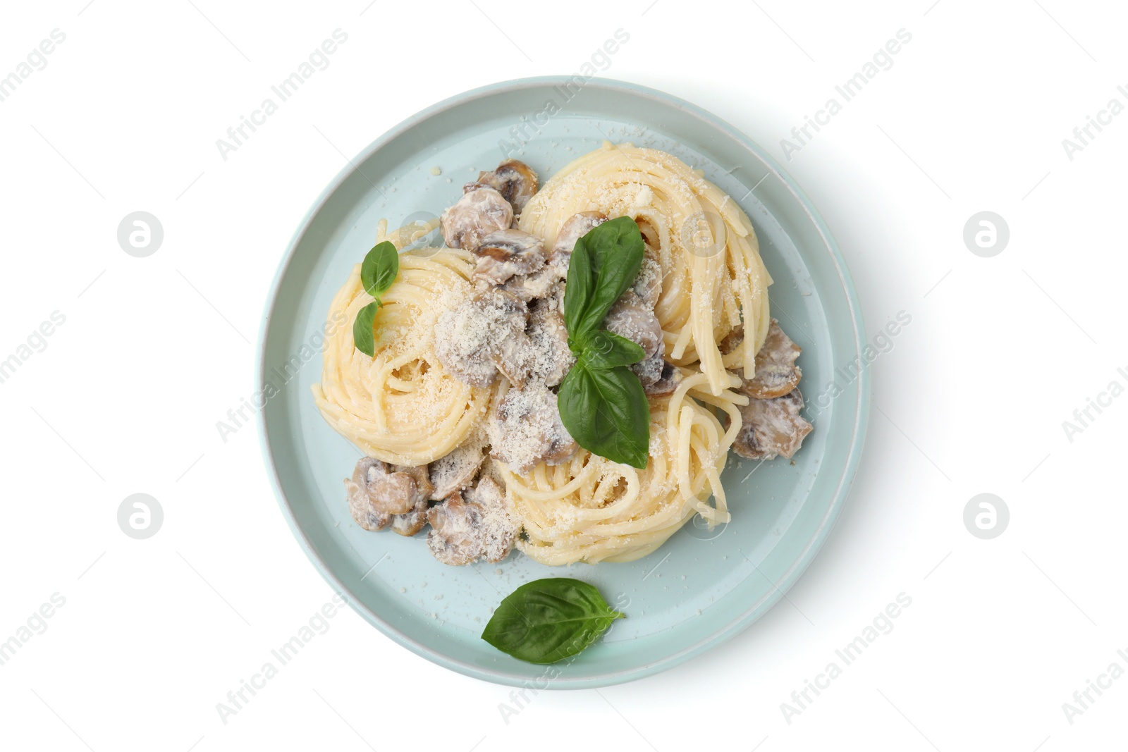 Photo of Delicious pasta with mushrooms and basil isolated on white, top view