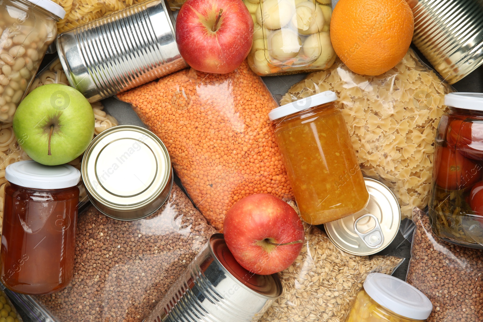 Photo of Food donation. Different products on table, top view