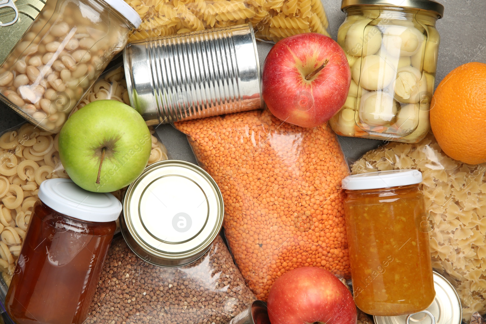 Photo of Food donation. Different products on table, top view