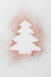 Christmas tree made of powder on white background, top view