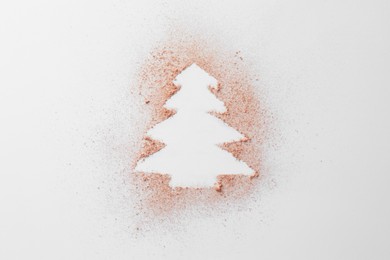 Photo of Christmas tree made of powder on white background, top view