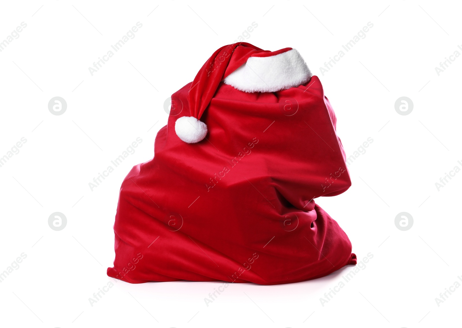 Red Santa Claus bag and hat isolated on white Photo of Red Santa Claus bag and hat isolated on white