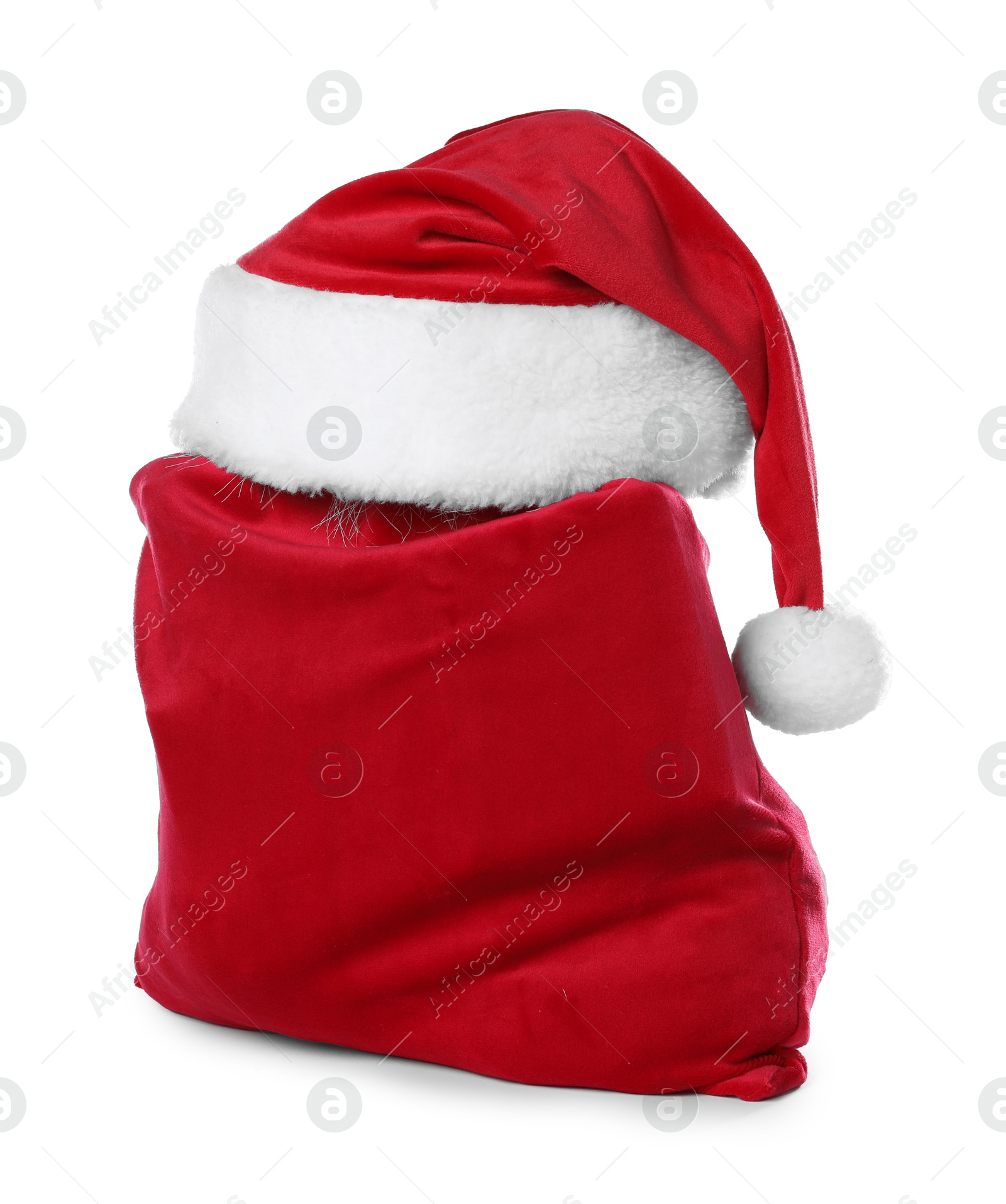 Red Santa Claus bag and hat isolated on white Photo of Red Santa Claus bag and hat isolated on white