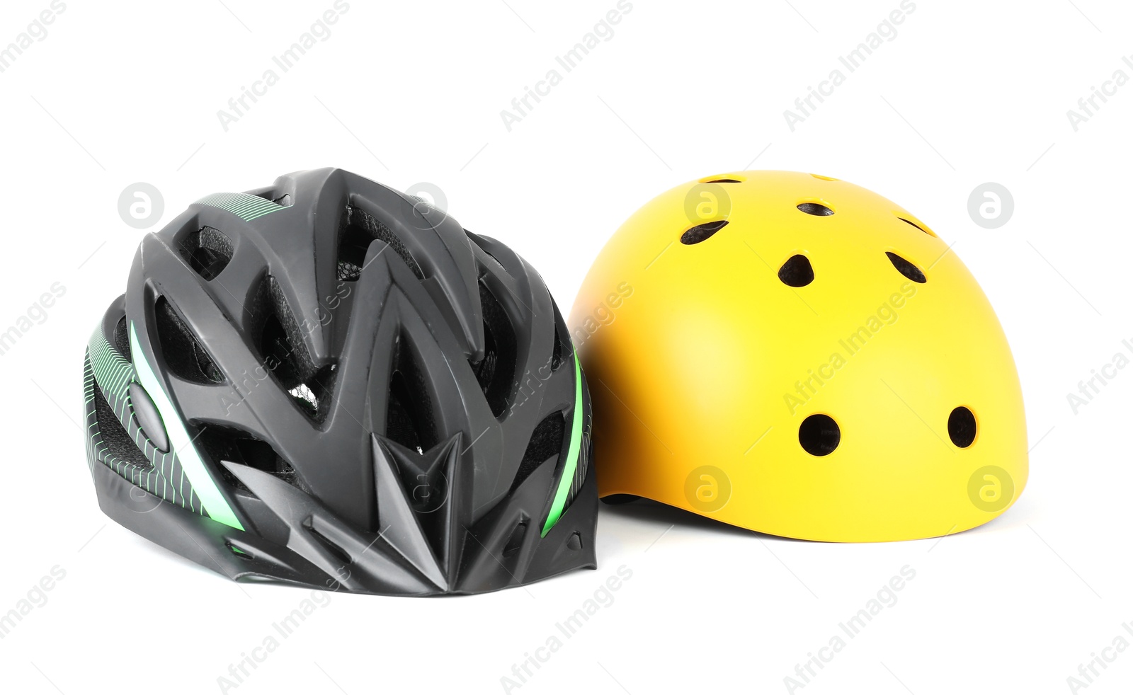 Photo of Different protective bicycle helmets isolated on white