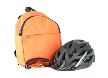 Photo of Bicycle helmet, goggles and backpack isolated on white