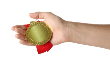 Photo of Woman with golden medal on white background, closeup