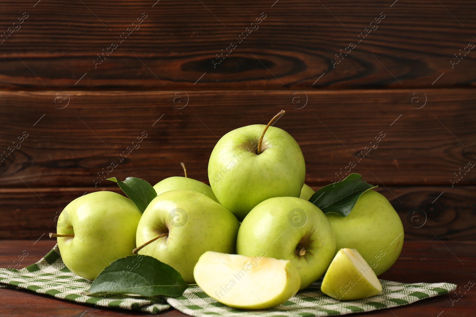 Photo of Many fresh green apples on wooden table