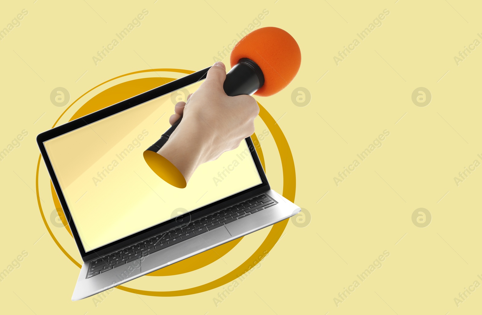 Image of Journalist's hand with microphone sticking out of laptop on color background. Creative collage