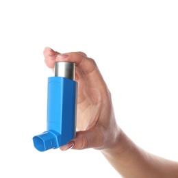 Woman holding asthma inhaler on white background, closeup