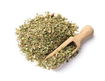 Pile of dried oregano and scoop isolated on white, top view