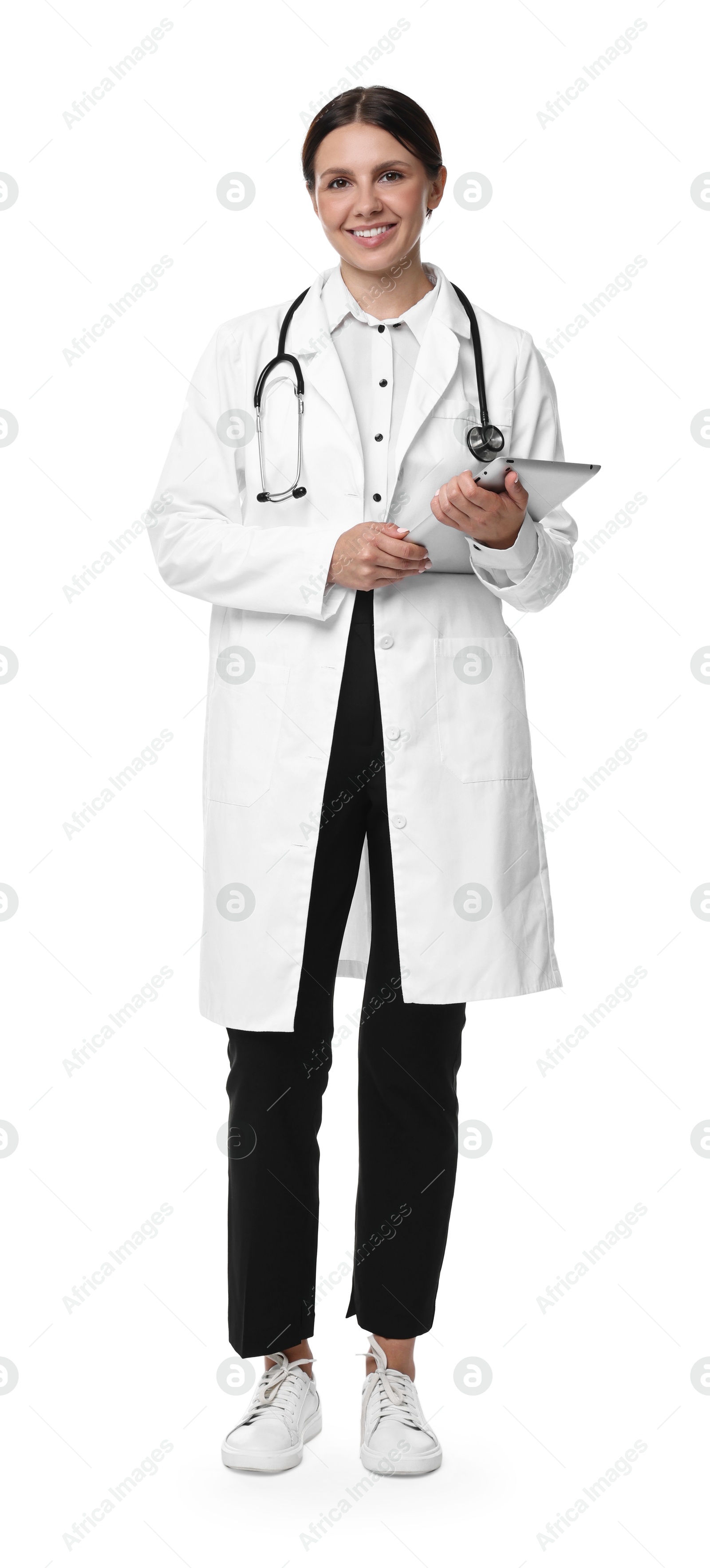 Photo of Smiling healthcare worker with stethoscope and tablet on white background