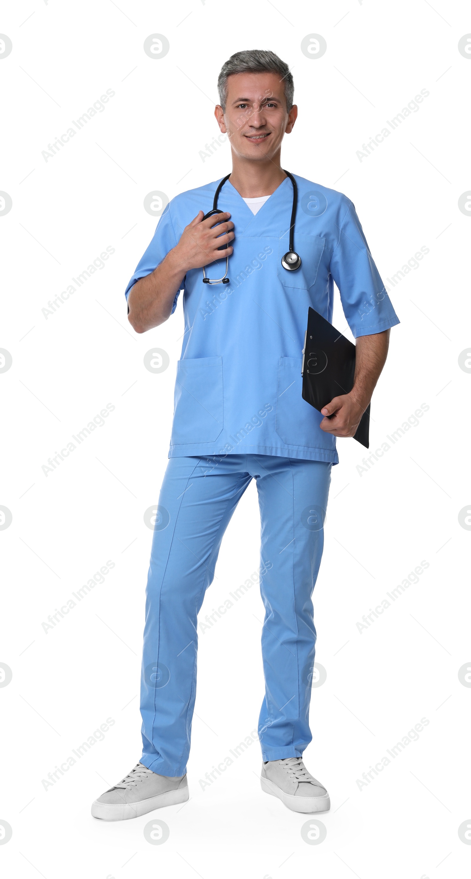 Photo of Smiling healthcare worker with stethoscope and clipboard on white background