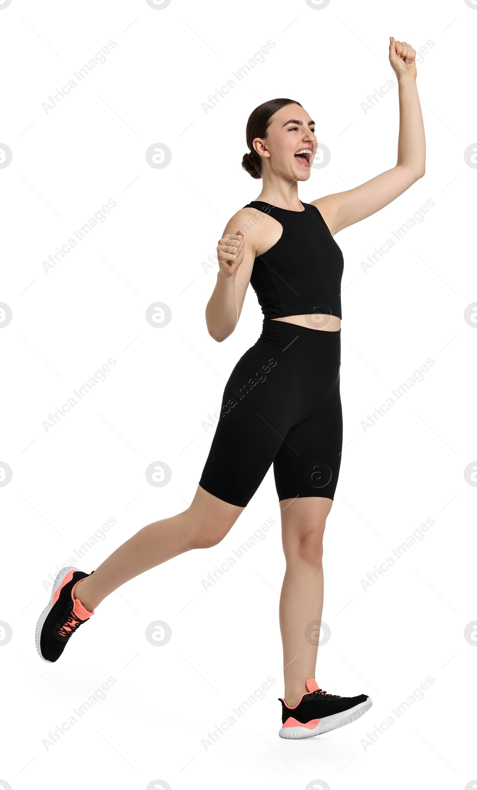 Photo of Beautiful woman in sportswear running on white background