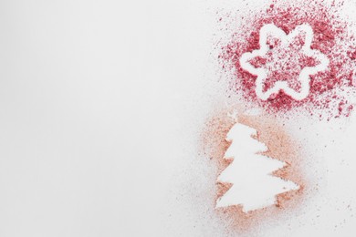 Christmas tree and star made of powder and blush on white background, top view. Space for text