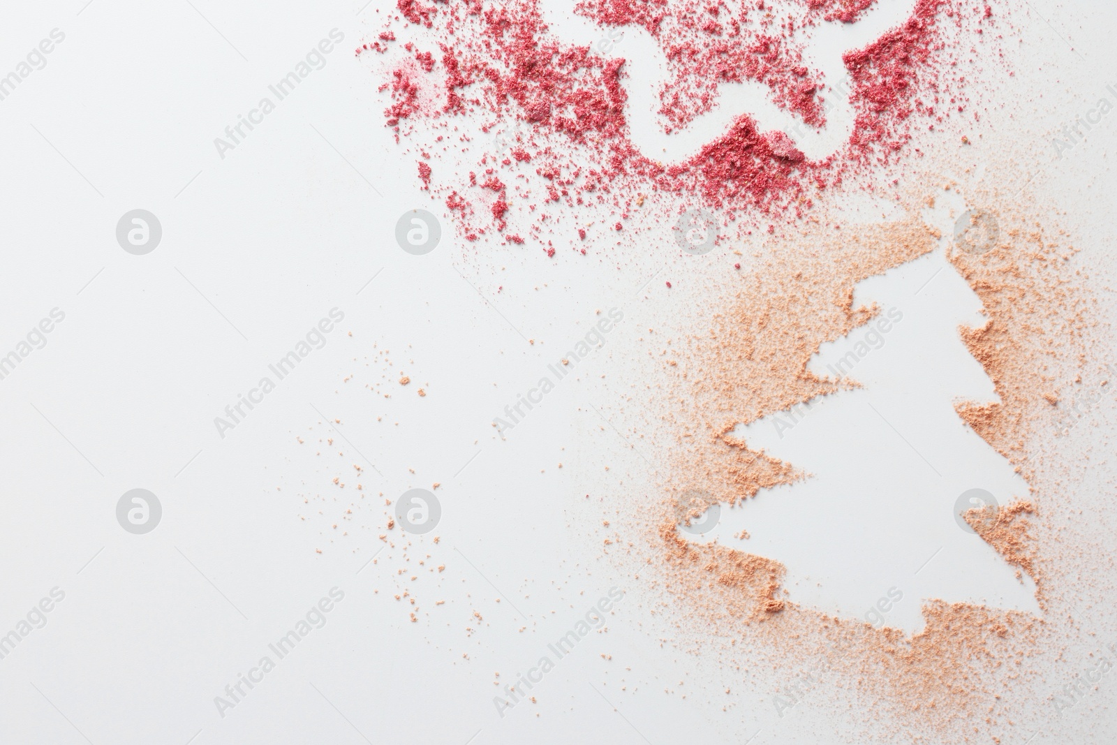 Photo of Christmas tree and star made of powder and blush on white background, top view. Space for text