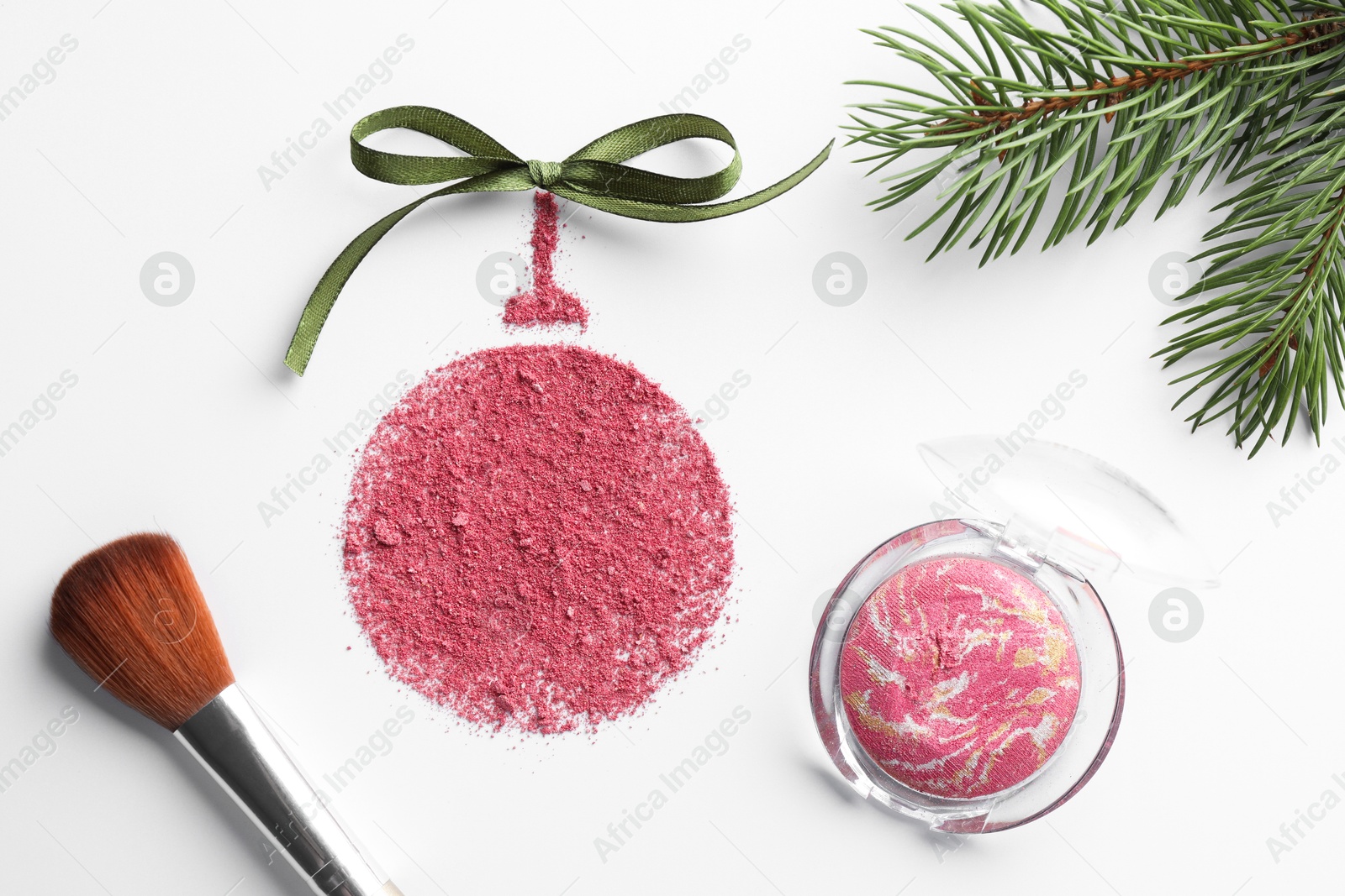 Photo of Christmas ball made of blush with bow, makeup brush and fir branch on white background, flat lay