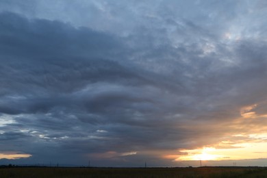 Photo of Picturesque view of sky with clouds on sunset