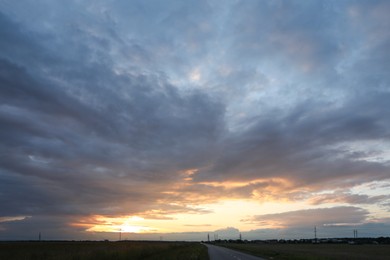 Photo of Beautiful cloudy sky over highway on sunset