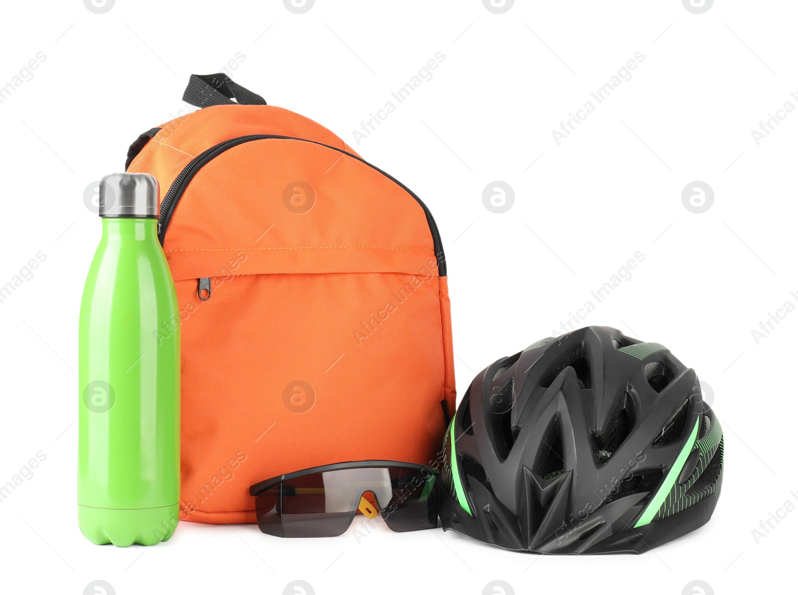 Photo of Bicycle helmet, goggles, thermo bottle and backpack isolated on white