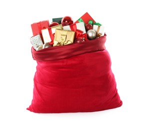 Photo of Santa Claus bag with gift boxes and Christmas balls isolated on white