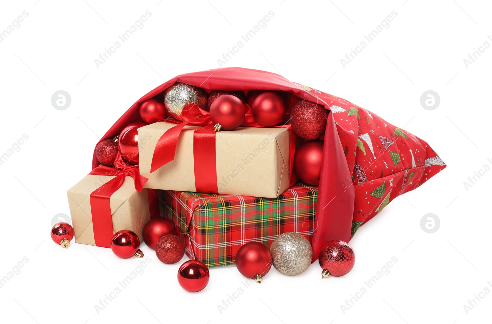 Photo of Santa Claus bag with gift boxes and Christmas balls isolated on white