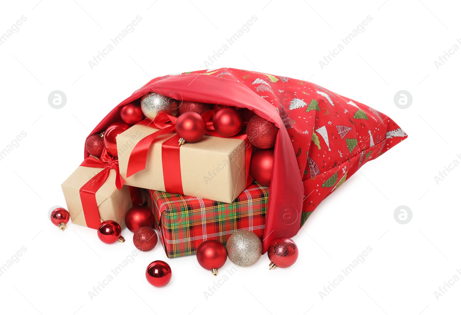 Photo of Santa Claus bag with gift boxes and Christmas balls isolated on white