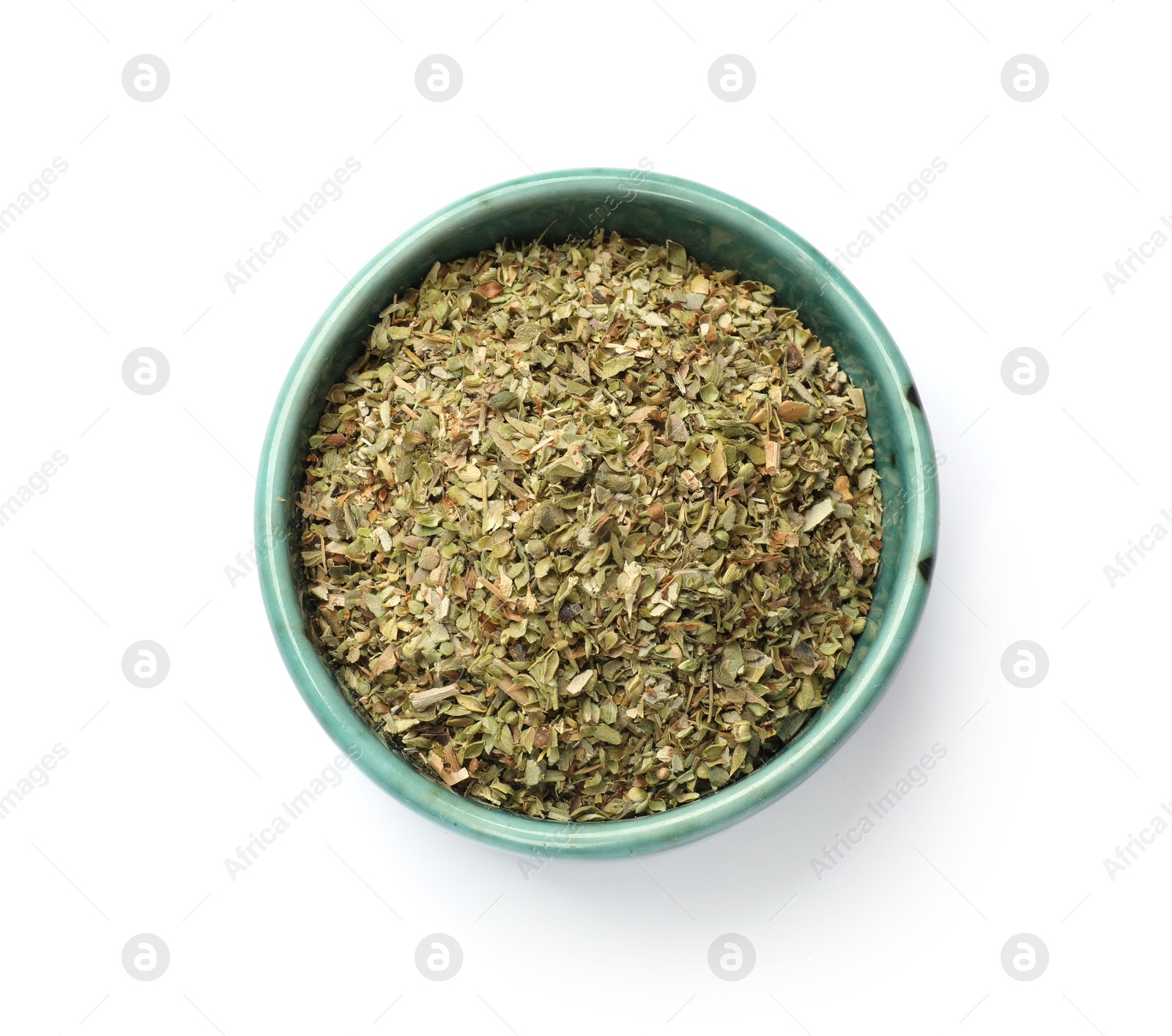 Photo of Dried oregano in bowl isolated on white, top view