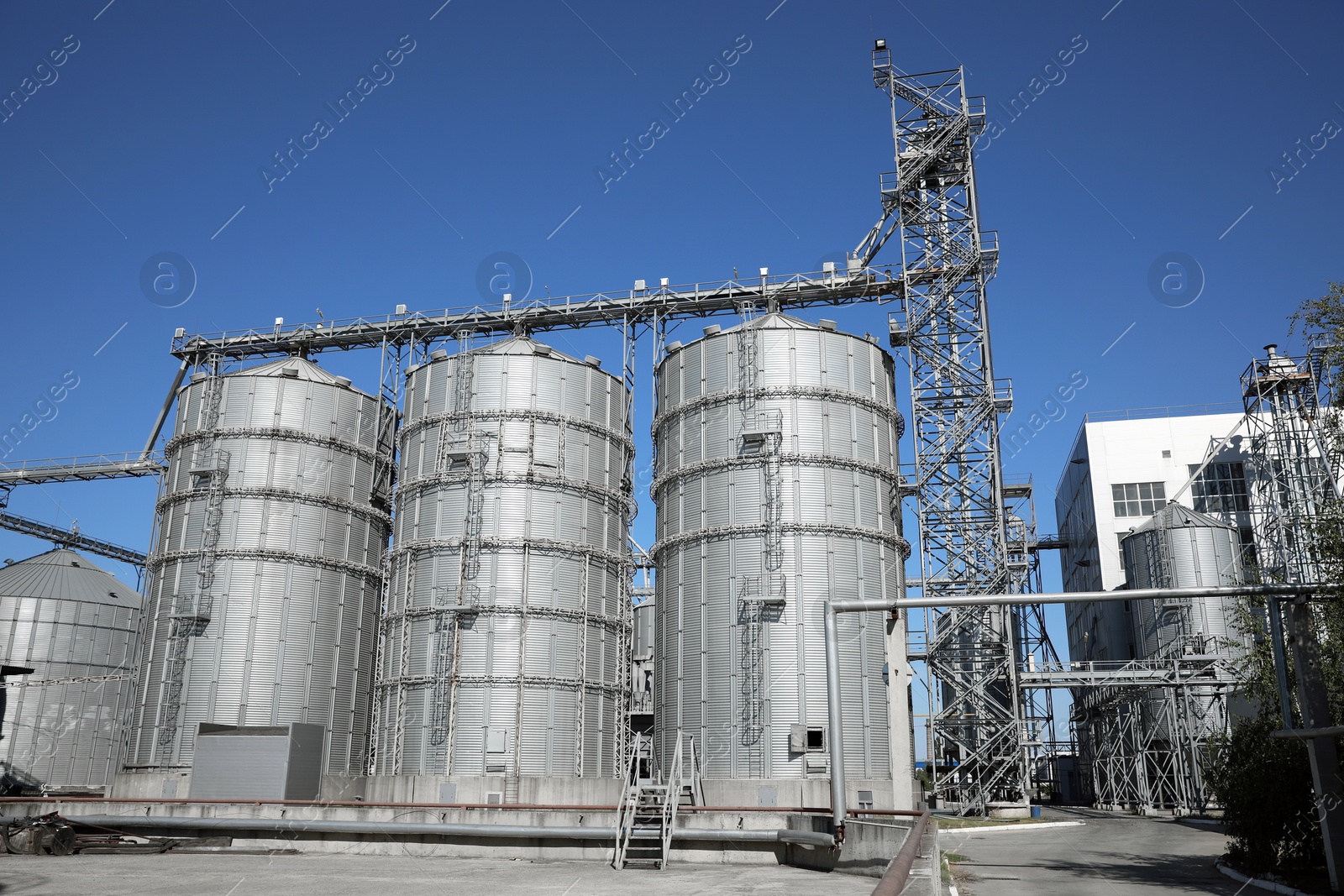 Photo of View of modern granaries for storing cereal grains outdoors