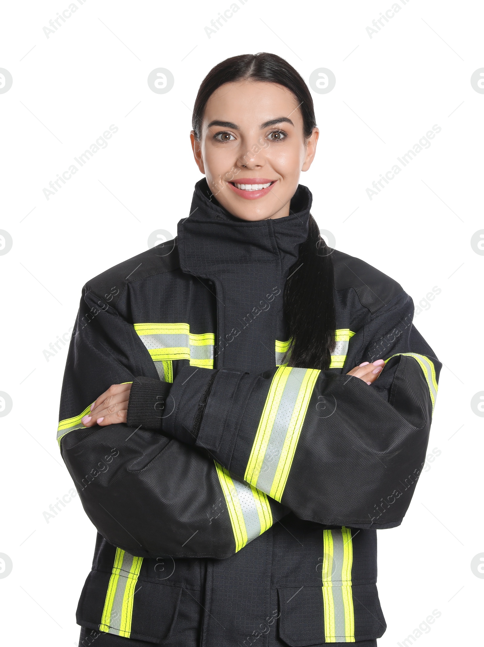 Photo of Portrait of firefighter in uniform on white background