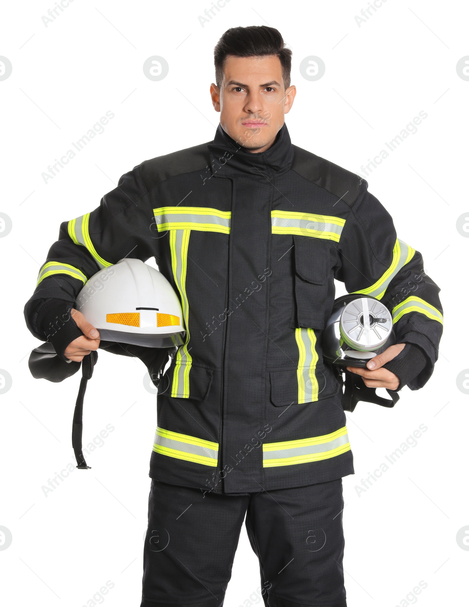 Photo of Portrait of firefighter in uniform with helmet and gas mask on white background