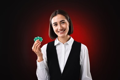 Photo of Croupier with casino chips on dark red background