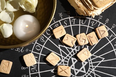 Photo of Flat lay composition with wooden runes on divination mat