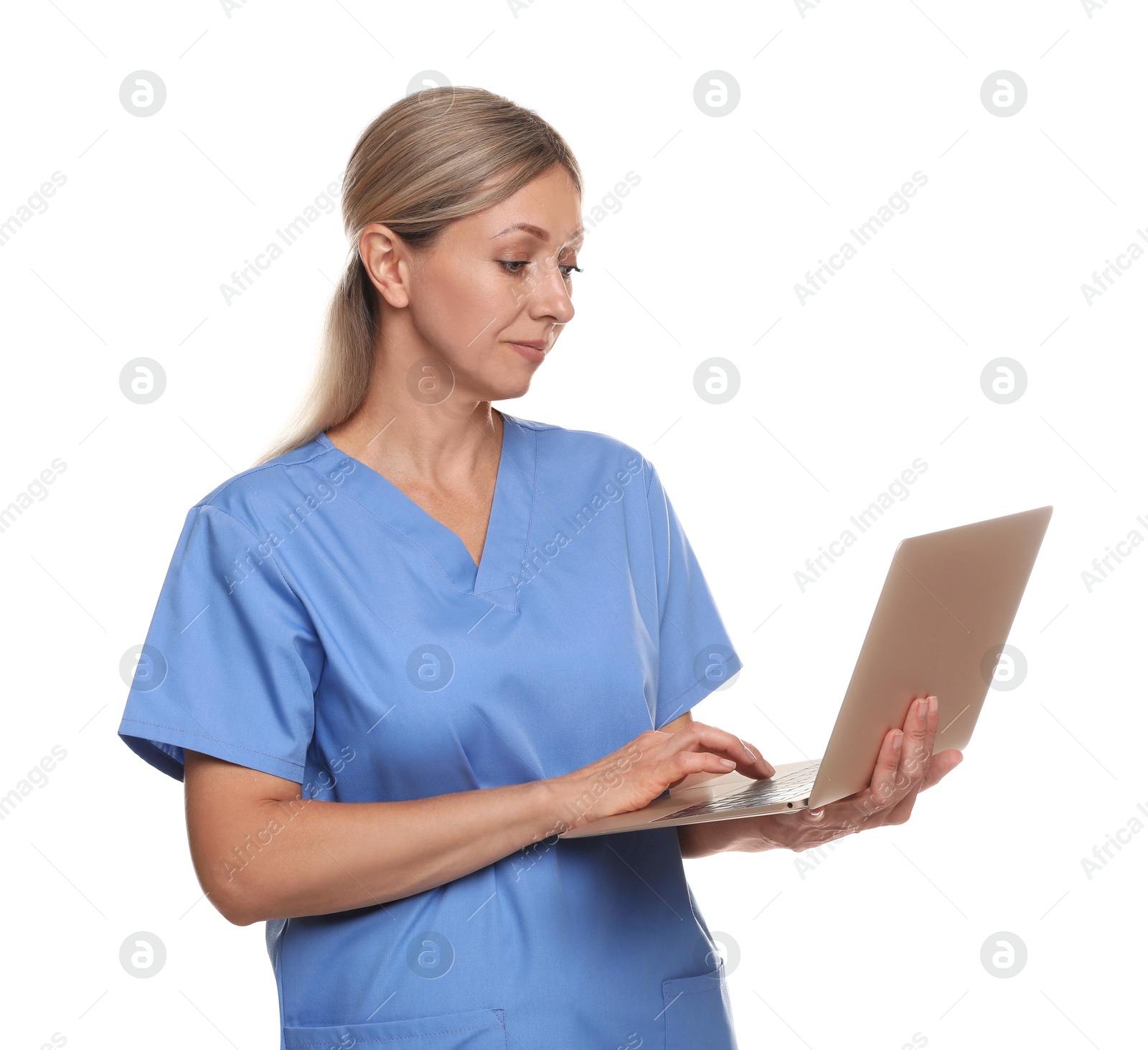 Photo of Doctor in medical uniform with laptop isolated on white