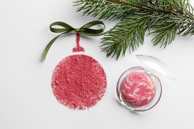 Christmas ball made of blush with bow and fir branch on white background, flat lay