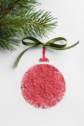 Christmas ball made of blush with bow and fir branch on white background, flat lay