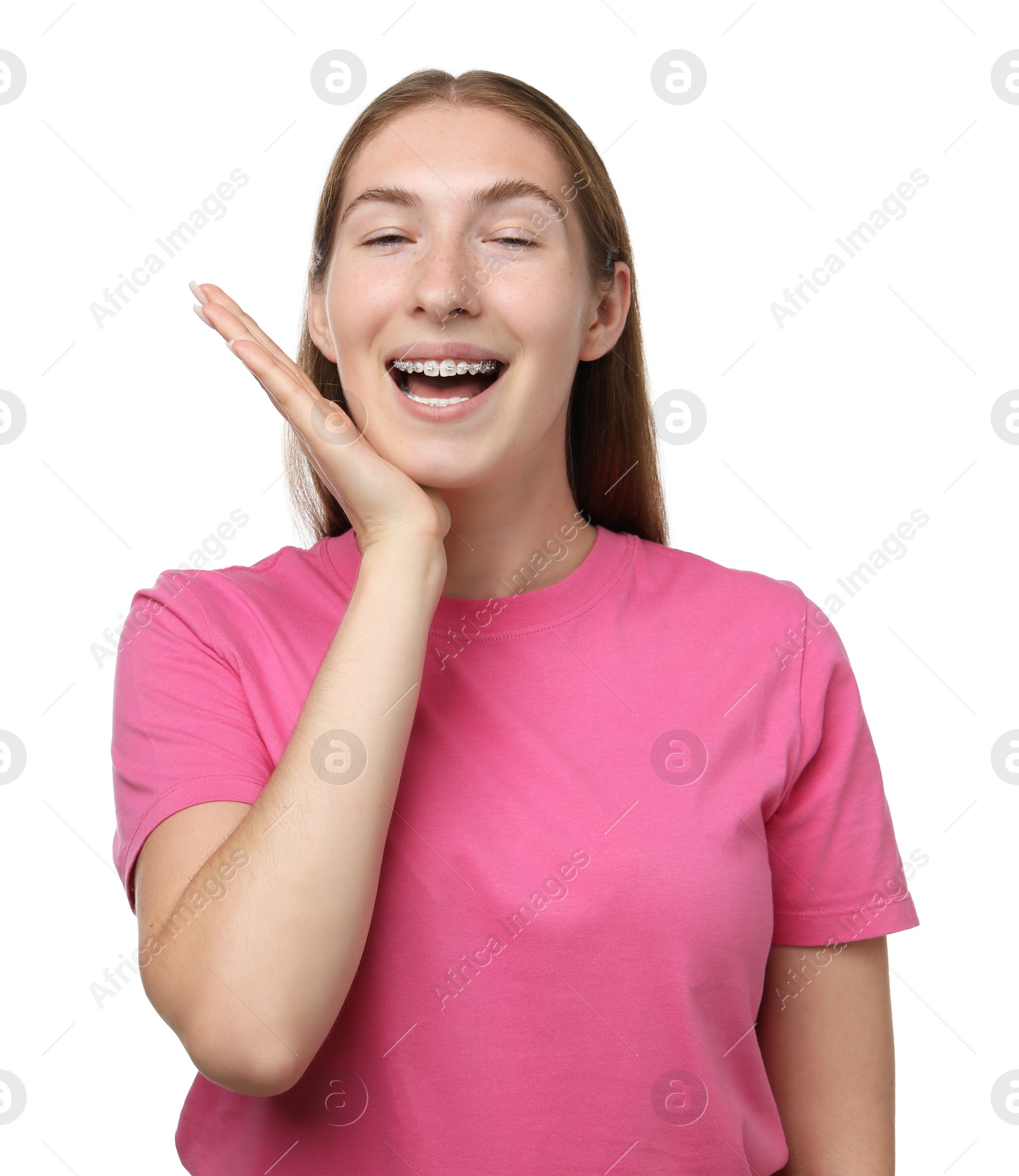 Photo of Smiling girl with braces on white background