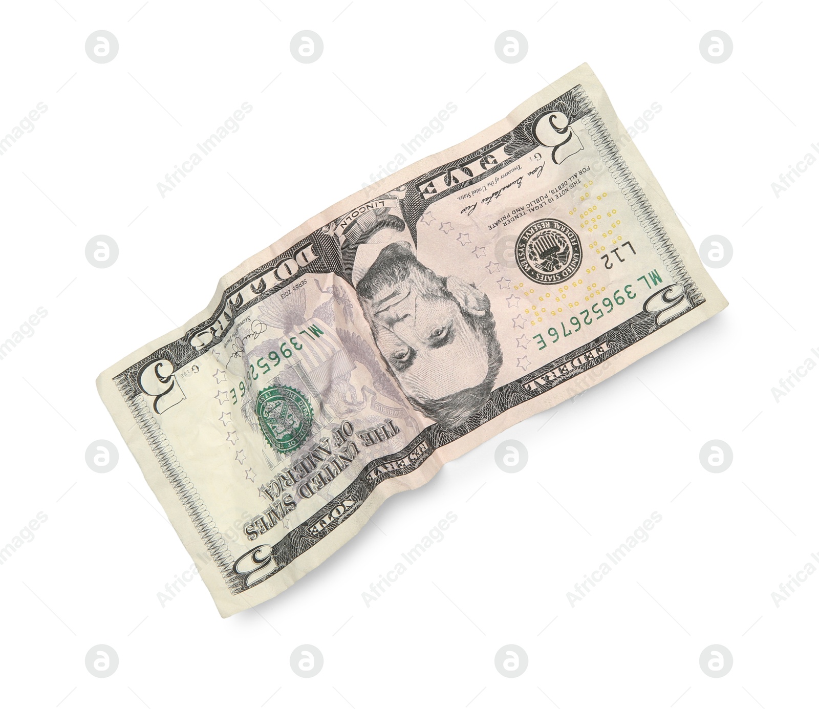 Photo of One crumpled dollar banknote isolated on white, top view