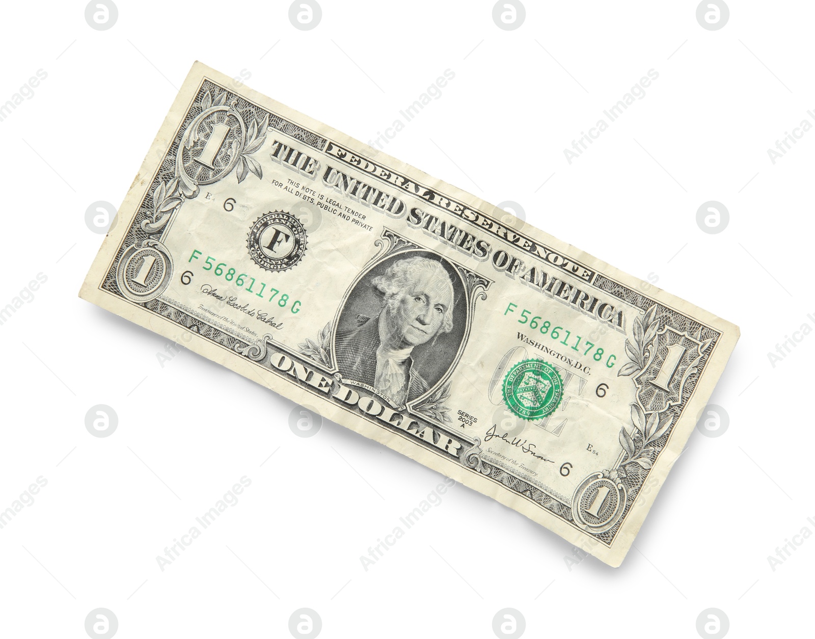 Photo of One crumpled dollar banknote isolated on white, top view