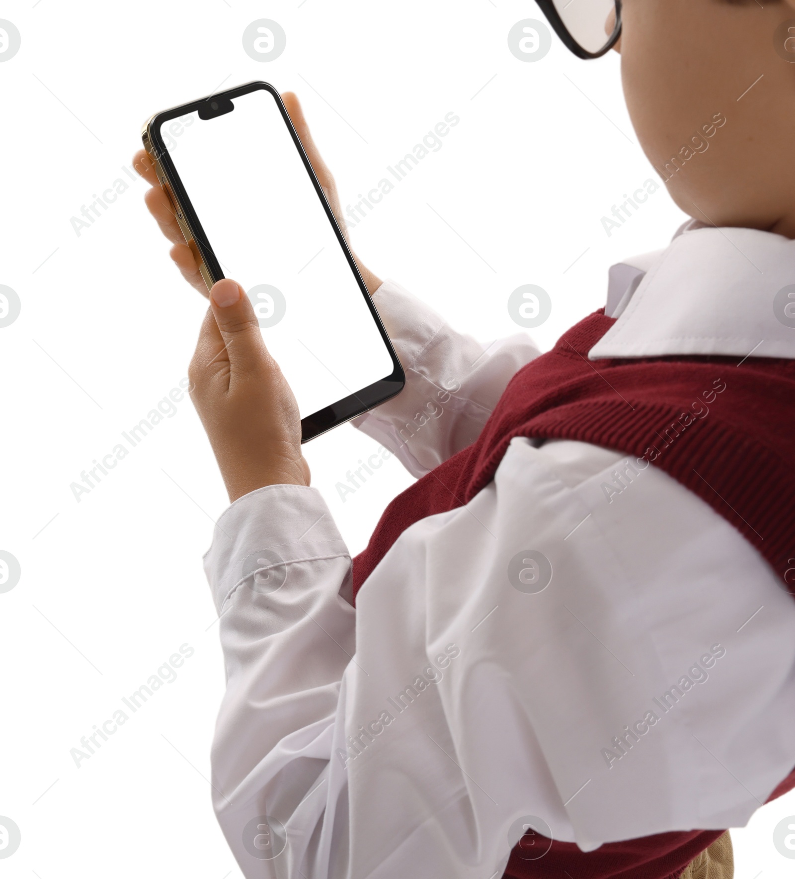 Photo of Little boy with smartphone on white background, closeup