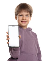 Cute little boy with smartphone on white background