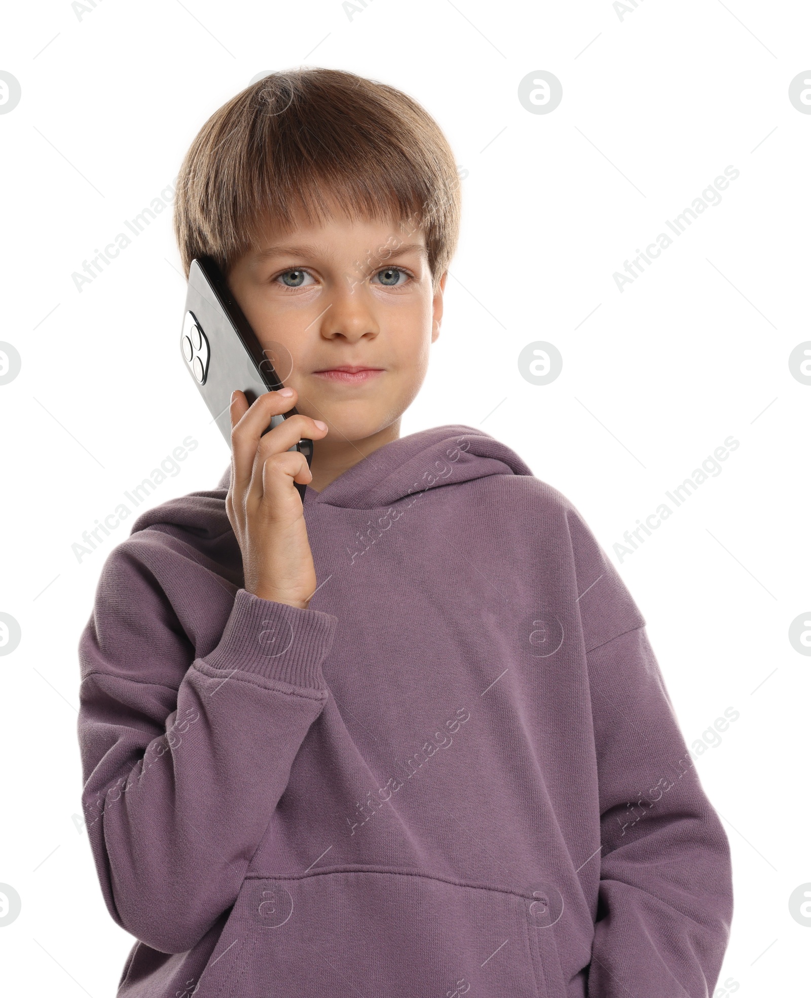 Photo of Cute little boy talking on smartphone against white background