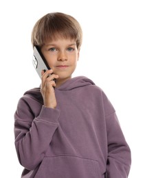 Cute little boy talking on smartphone against white background