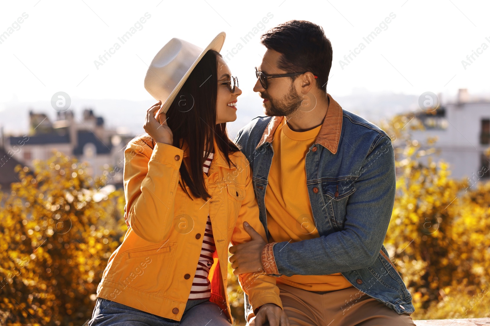 Photo of Beautiful couple in sunglasses outdoors on autumn day